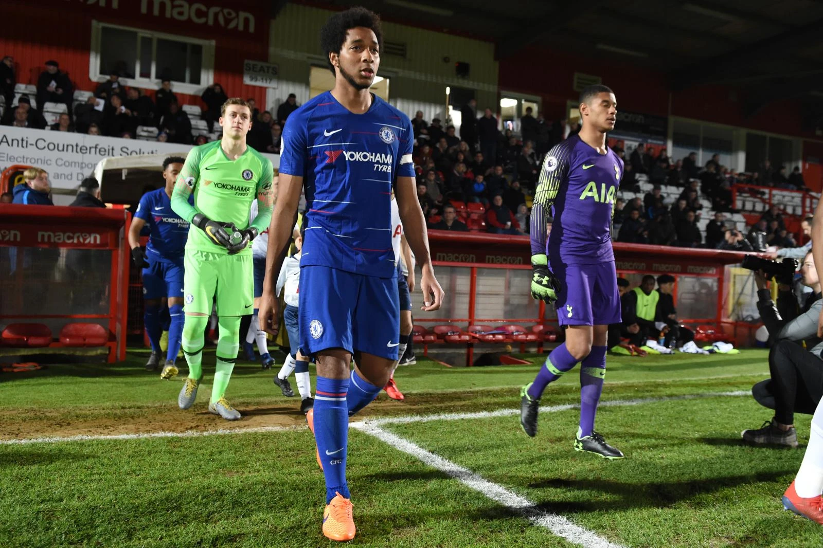 Richard walking out onto the pitch in a Chelsea shirt